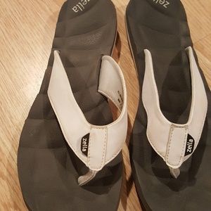 White Zella flip flops